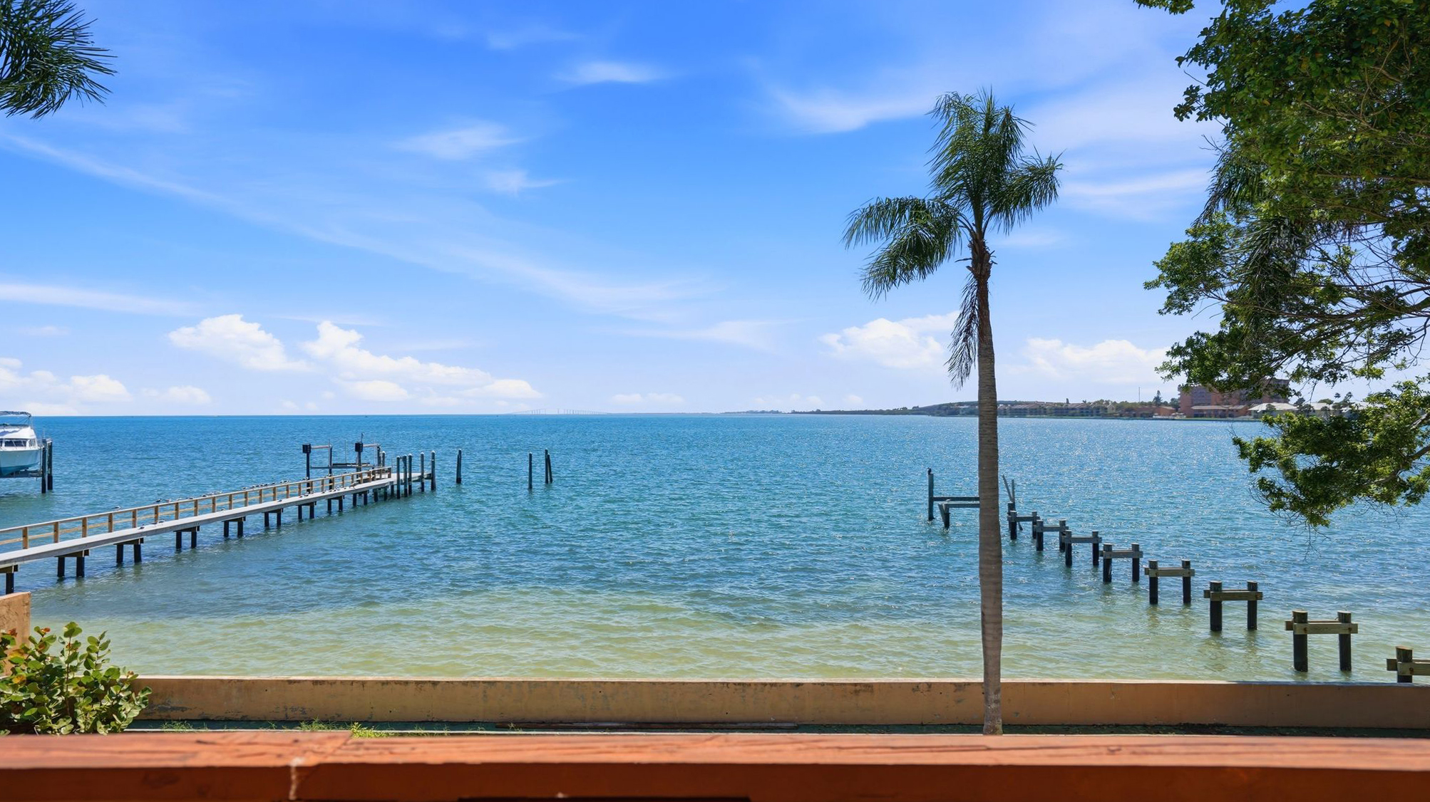View from the deck looking across Tampa Bay with private dock extending into the water